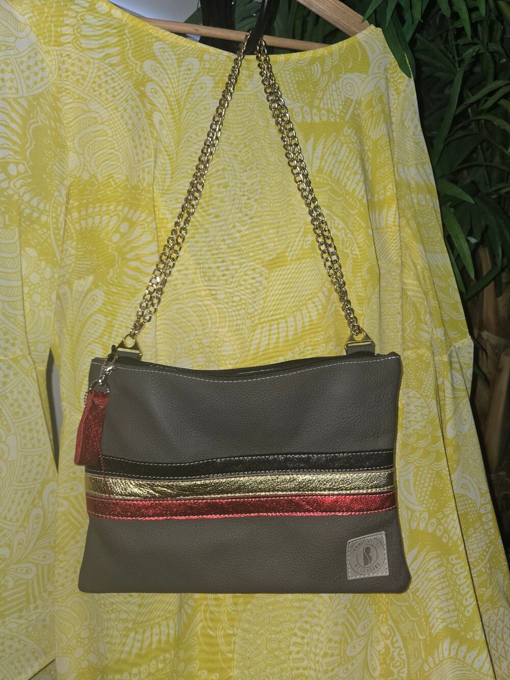 Title: Bare Soles Moccasins Genuine Leather Crossbody Bag with Metallic Stripes